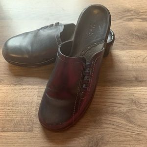 Clark’s teal clogs